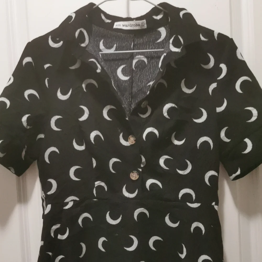 Stylish Black and White Mini Dress Cresent Moon, it has pockets. - Picture 6 of 7